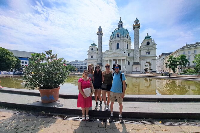 Fall in Love with Vienna Tour- the best of Vienna on foot! - The Parliament fountain and city hall, spotting meaning in stone