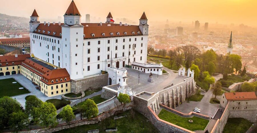 From Vienna: Bratislava with Local Guide, Castle & UFO Views - Bratislava Castle: skyline photos, short walk, and a heads-up