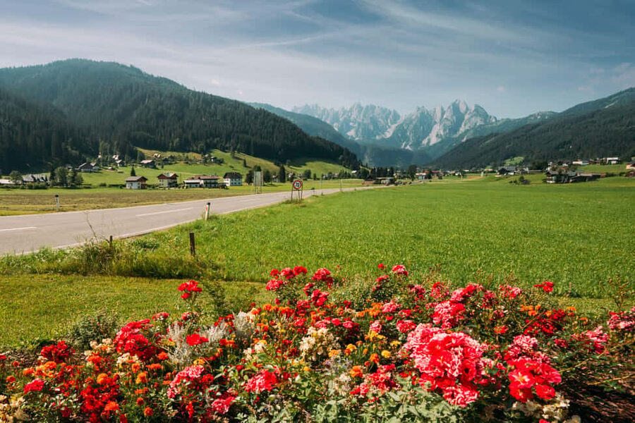 From Vienna: Mountains, Hallsttat & Salzburg Guided Day Tour - Coach Comfort: Vienna to Upper Austria Without the Headache