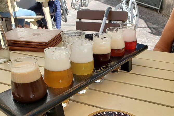 Innsbruck: A Walking Food Tour with Full Meal by Do Eat Better - Stop by stop: brezel at Herzog-Friedrich-Straße, then Markt­halle cheese and wine