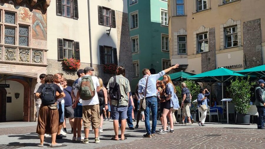 Innsbruck: Private City Tour by a licenced "Austria Guide" - Golden Roof: The Courtyard Scene Behind the Most Famous Facade
