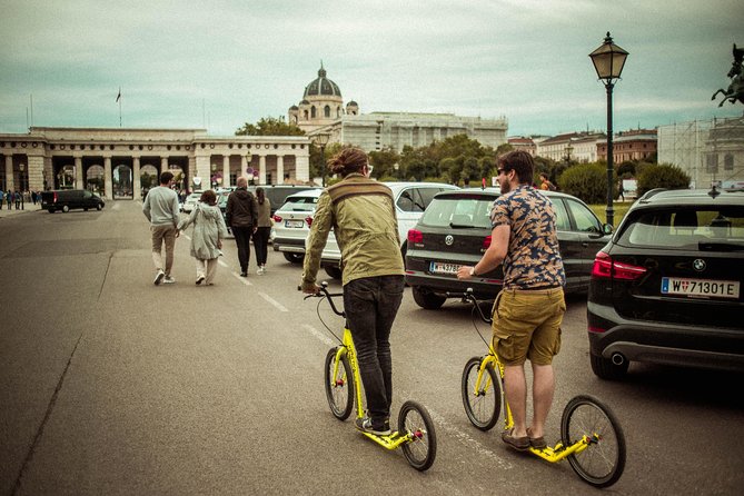 Kick-Bike Small-Group Tour Through Vienna with Locals - MuseumsQuartier stop at Komische Kunste im MQ: twin-museum square and postwar context