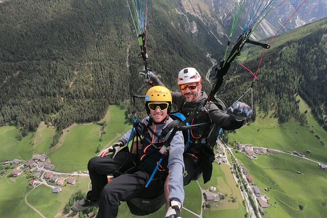 Paragliding & Tandemflüge with World Champion & Team, Stubaital - Landing, Certificate, and Photos to Your Phone