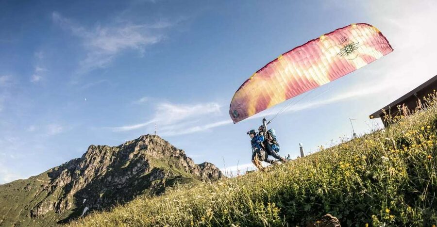 St Johann in Tirol: Tandem Paragliding - Cablecar Rise and the Mountain Top Moment Before Takeoff