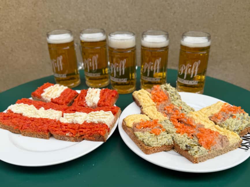 Vienna: Guided Food Tour with 8+ Food Tasting & Secret Dish - Open-faced sandwich and pfiff beer, a classic Viennese pause