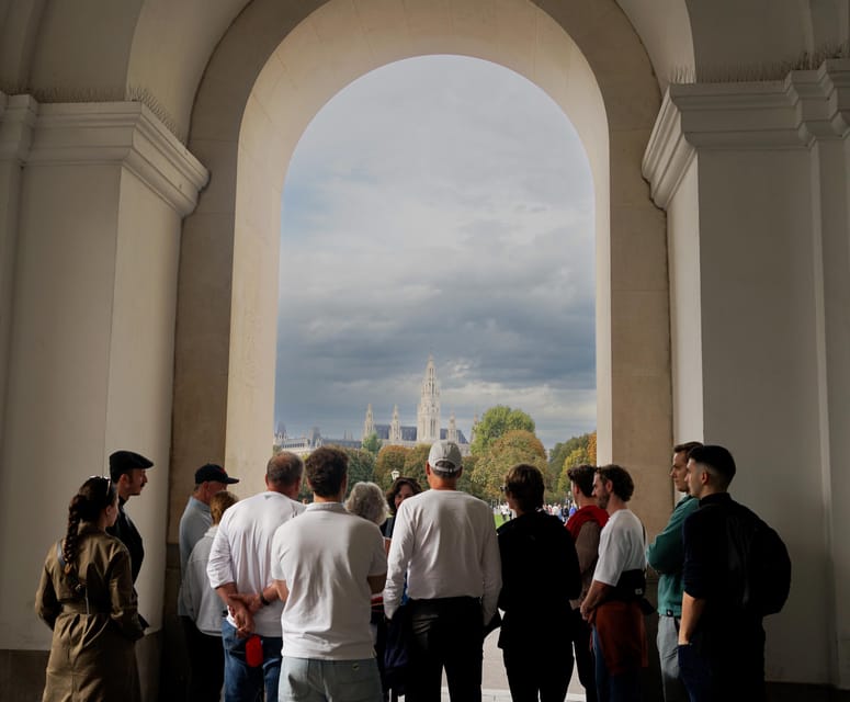 Vienna: Guided Walking Tour of City Highlights & Hidden Gems - Michaelerplatz and the Hofburg Palace entrance: learning power by the facade