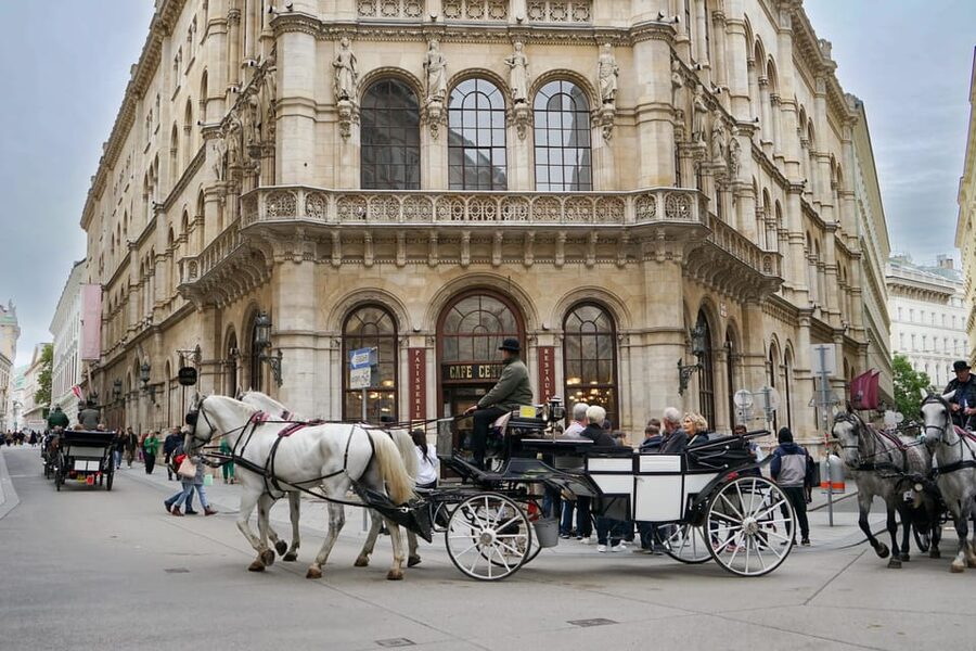 Vienna: Guided Walking Tour of City Highlights & Hidden Gems - Heldenplatz and the Spanish Riding School: imperial tradition in plain sight